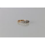 18ct gold diamond five stone ring, the central stone approximately 0.3cts, ring size N, 3.6g