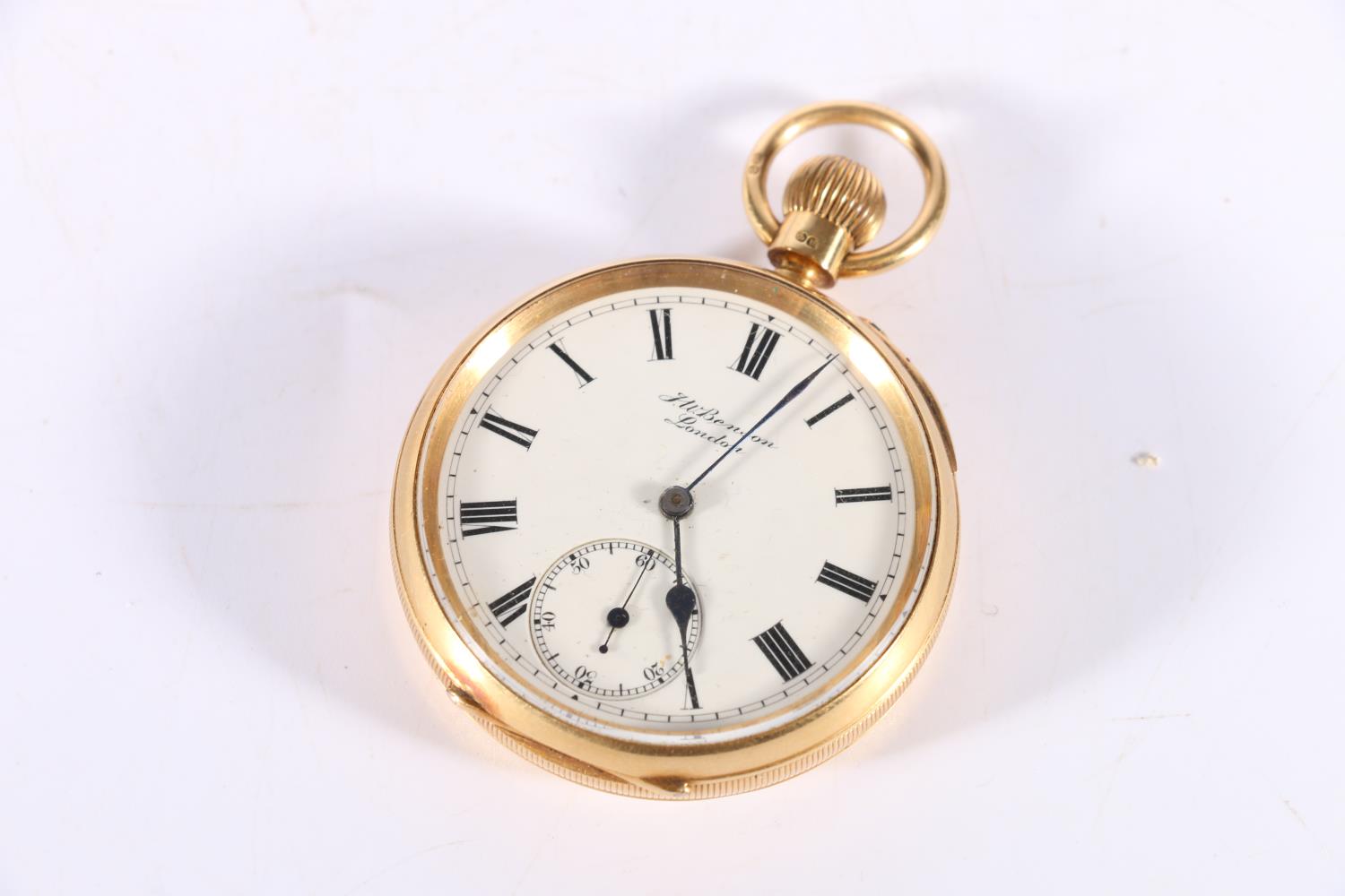 18ct gold cased open face keyless pocket watch by Benson of London, the white enamel dial with Roman