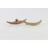 Victorian 9ct gold brooch of crescent shape set with seed pearls having heart surmount set with