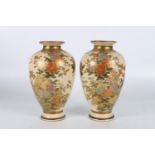 CHOSUZAN, a pair of Japanese Satsuma vases of high shouldered baluster form decorated with