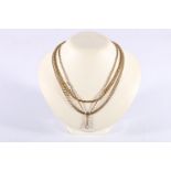 9ct gold curb link neck chain 5g, a 10ct gold watch guard 7.2g and a 9ct yellow gold rope twist