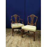 Hepplewhite style mahogany elbow chair with matching side chair, shield shaped top above a