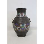 Chinese bronze champleve enamel vase of baluster form, late Quing dynasty, with bands of archaic