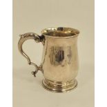 Silver baluster mug with leaf capped scroll handle, initialled maker's mark overstruck by that of