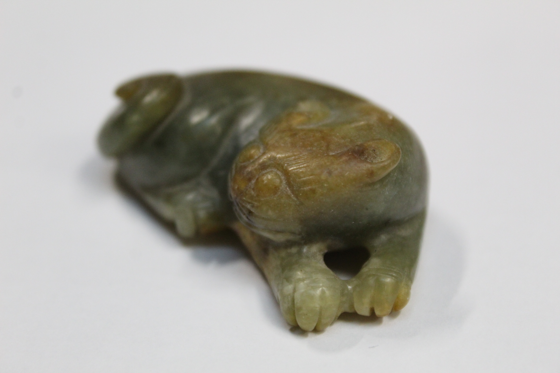 Three Chinese archaic and archaised jade figures to include a repose cat figure, a rectangular - Image 5 of 14