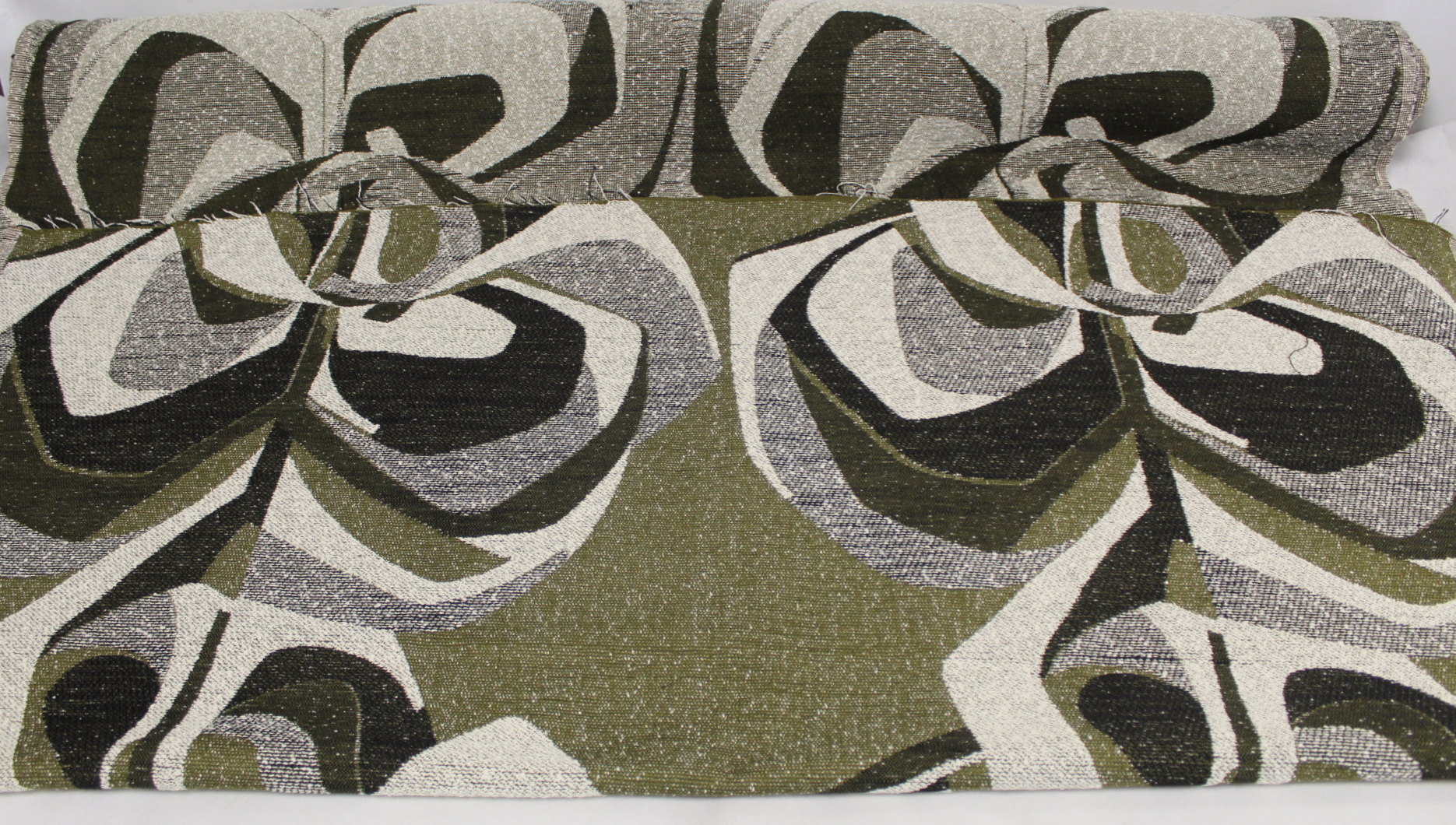 Roll of John Wright for Edinburgh Weavers "Kabadi" jacquard weave fabric in dark olive green and