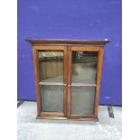 Oak glazed two door wall cabinet