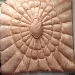 Early 20th century eiderdown of peach satin quilted and embroidered decoration, cotton backed,
