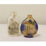 Two antique Chinese inside painted glass snuff bottles, to include one of elongated form with