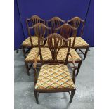 Set of six 19th century mahogany dining chairs, slip in seats on square supports to include a carver