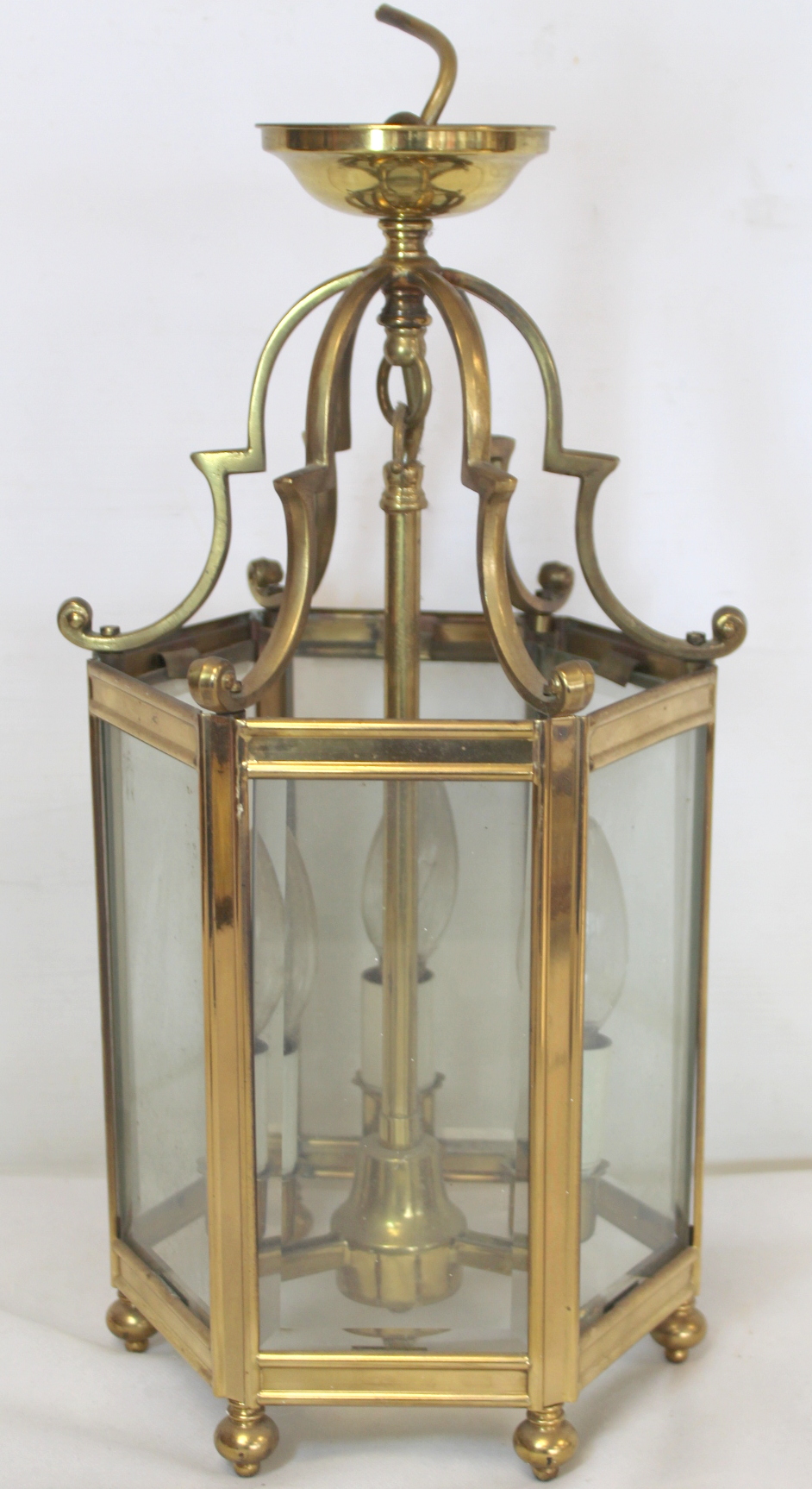 Georgian style brass hall lantern of hexagonal form with bevelled glass panels, domed scroll - Image 3 of 4