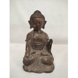 Chinese bronze statue of the seated Buddha, traces of gilding, Qianling mark, 28cm high.
