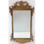 Georgian style walnut veneered wall mirror with fret cut frame, 68cm high.