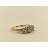 Diamond three stone ring with old cut brilliants, the largest approx. 4mm in gold and platinum.