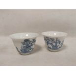 Pair of delicate Chinese porcelain blue and white 'month' cups, 4.5cm.