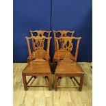 Set of four Georgian oak country chairs with pierced fiddle back, solid seat. 94cm high. (4).