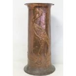 Arts & Crafts copper stick stand in the manner of Newlyn School, decorated with a pelican, fish