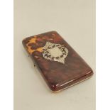 Victorian tortoiseshell card case with inlaid silver shield.