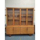 Retro walnut, burr elm and laburnum bookcase, designed by Gordon Russell for South Acre, Oadby,