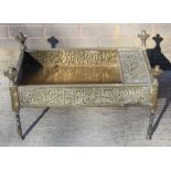 Islamic Cairoware brass trough of rectangular twin handled form with two fixed handles and four