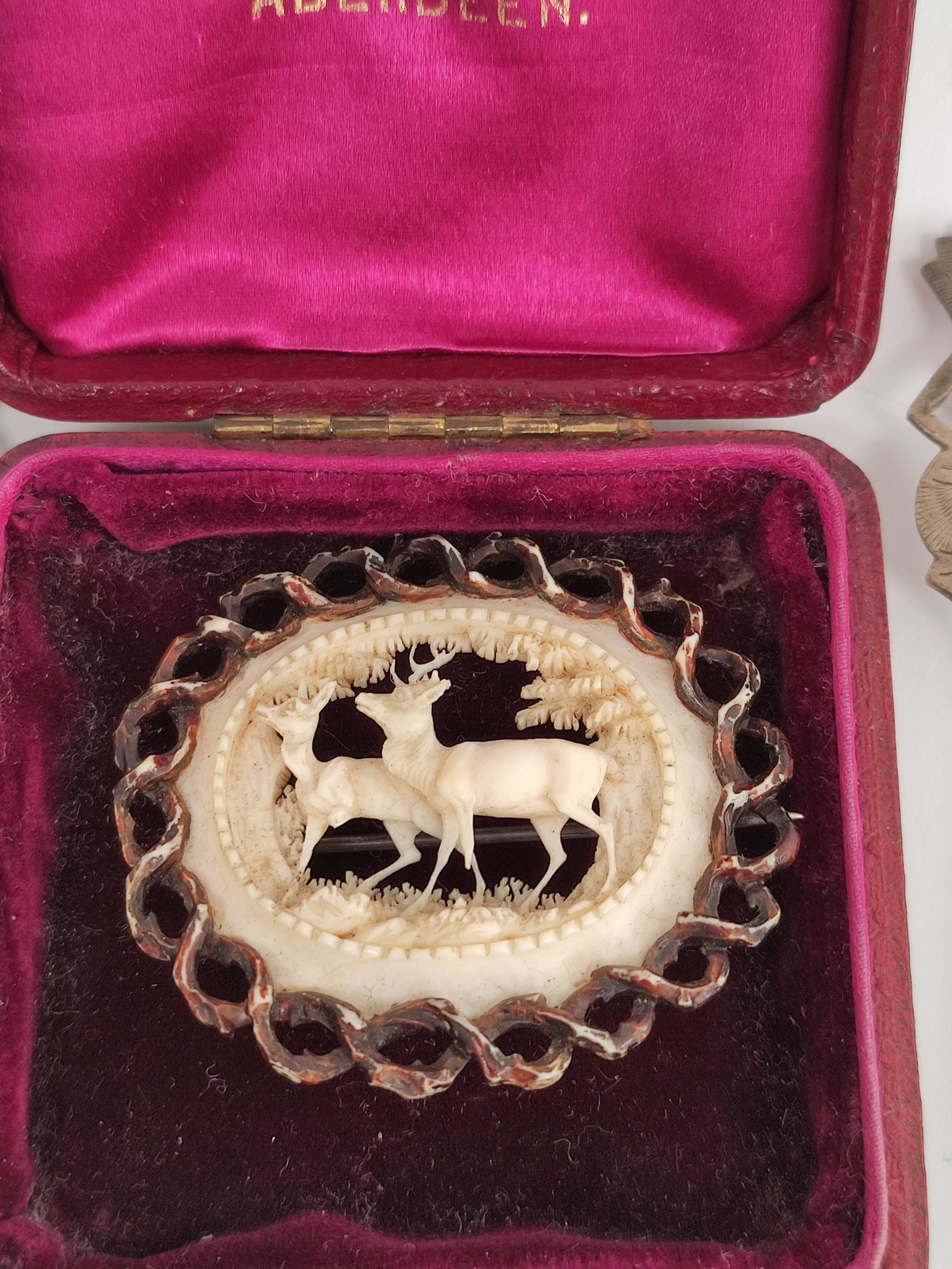 Five Indonesian silver coffee spoons and a delicately carved ivory brooch depicting a deer. - Image 2 of 6