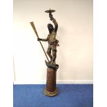 Italian Venetian polychromed gilt wood Blackamoor figure, modelled as a large figure standing on a