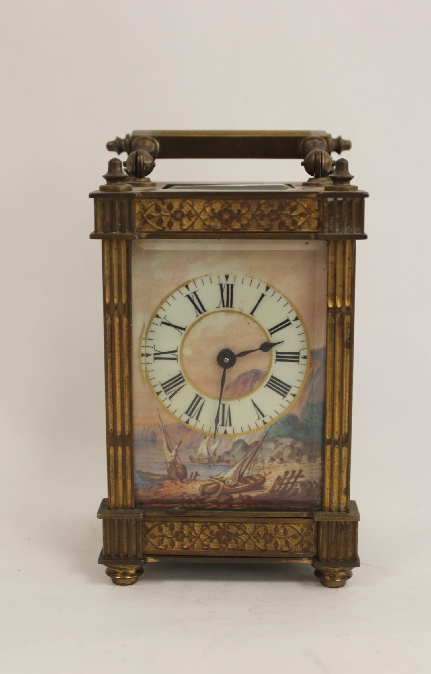 Cylinder carriage timepiece with painted and gilt porcelain dial depicting a coastal scene with