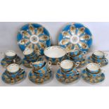 Victorian English porcelain part teaset with café au lait, white and gilt elliptical panels on a