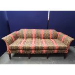 Mahogany upholstered sofa, upholstered in striped floral damask, raised on mahogany feet.