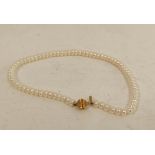 Baroque pearl bead necklace on 9ct gold ribbed ball snap.