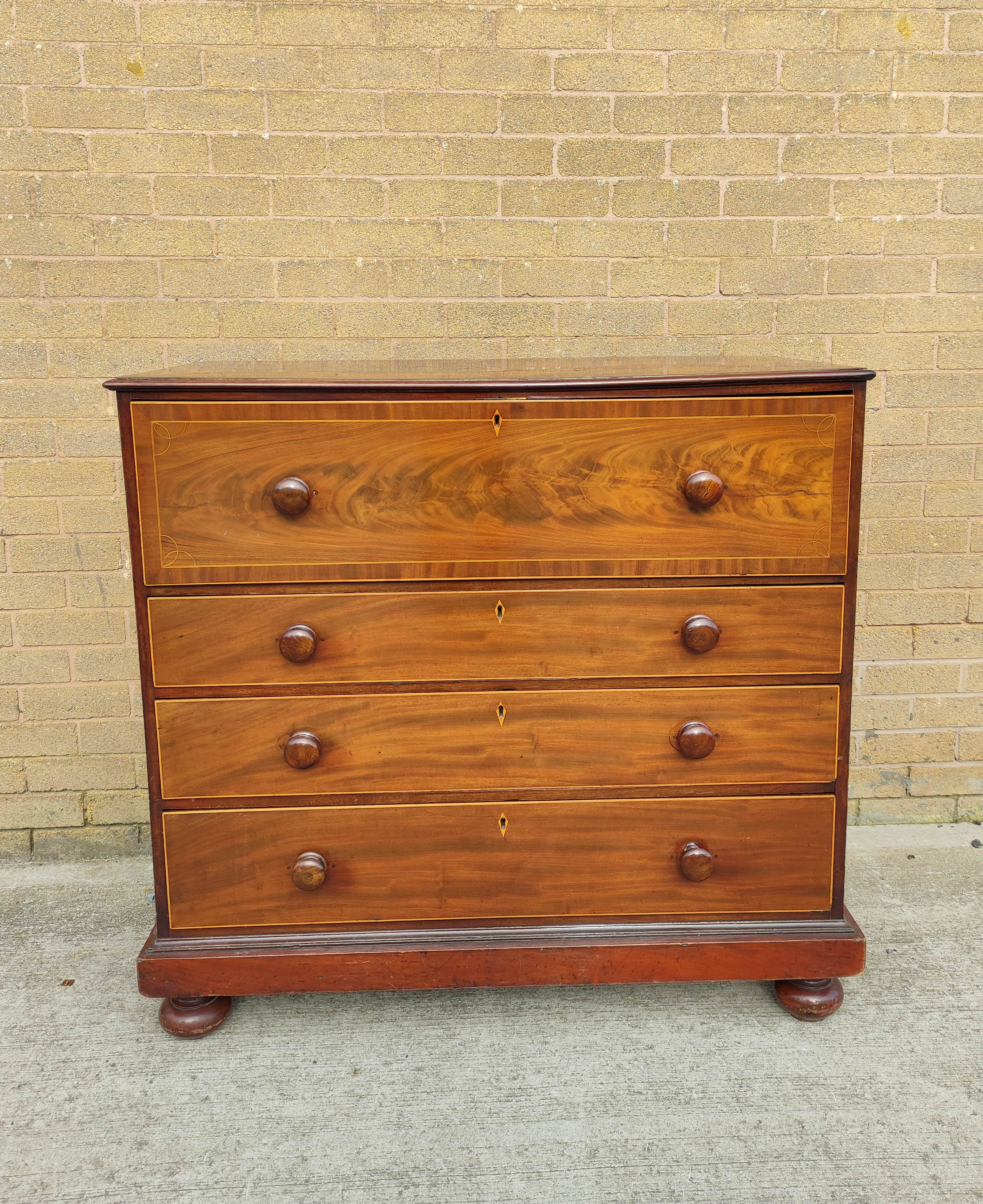 Georgian mahogany inlaid secretaire chest of drawers, the pull down secretaire drawer enclosing