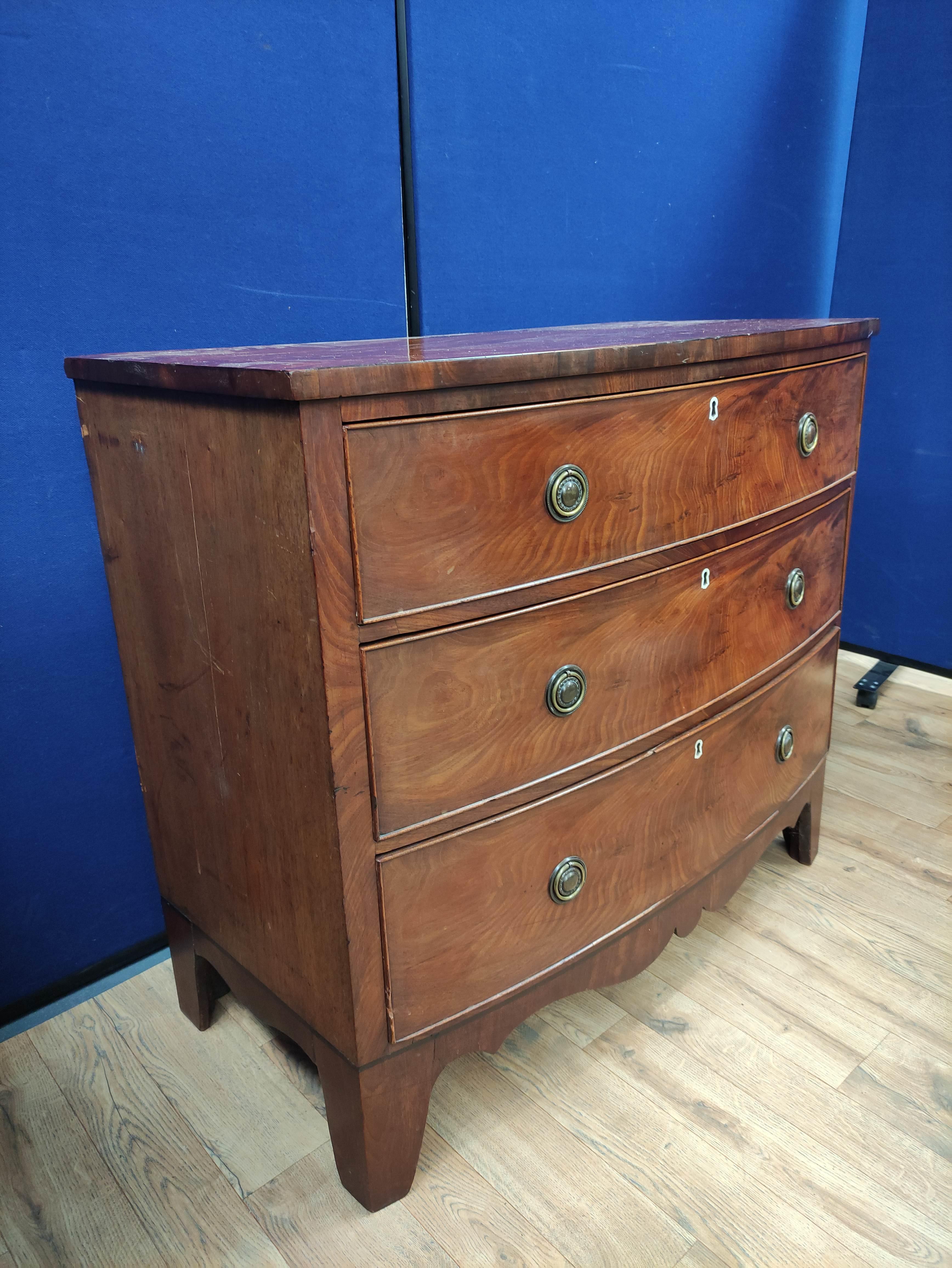 Georgian mahogany chest of drawers circa early 19th century, with three long drawers raised on - Image 4 of 6