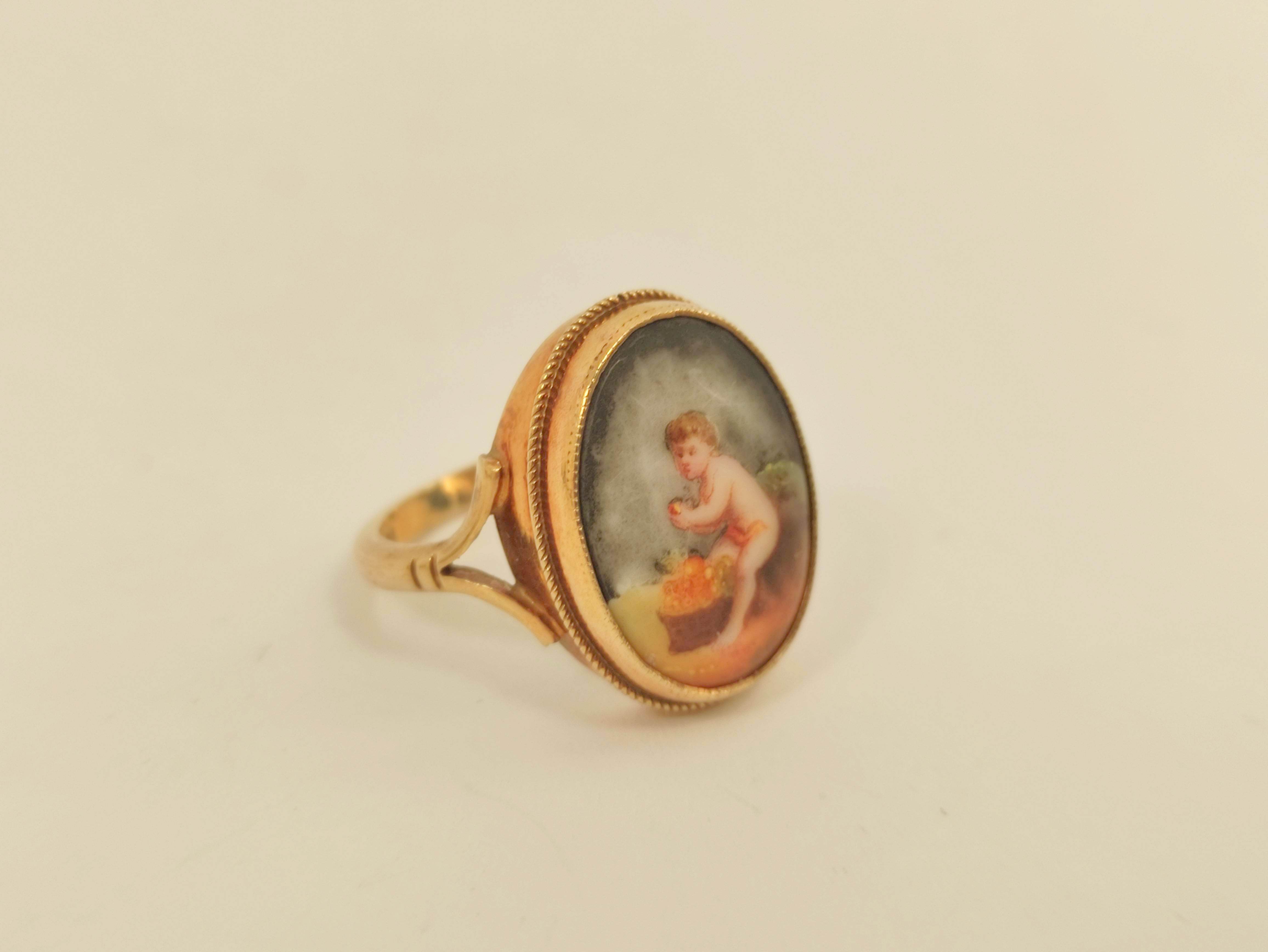 Victorian gold scarf pin with birds claw grasping a garnet bead and a 9ct gold ring with porcelain - Image 2 of 6