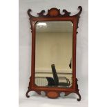 George III style mahogany fretwork wall mirror with scroll decoration, shell patera to top and