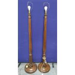 Pair of reeded column mahogany standard lamps on turned bases