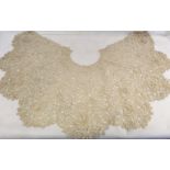 Fine large Victorian cream lace collar or cape with floral and foliate scrolls and lobed border,