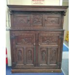 Antique Charles II style oak jointed court cupboard with carved wood panel of a fox with game