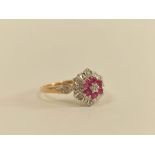 Diamond and ruby cluster ring in 9ct gold. Size 'P'.