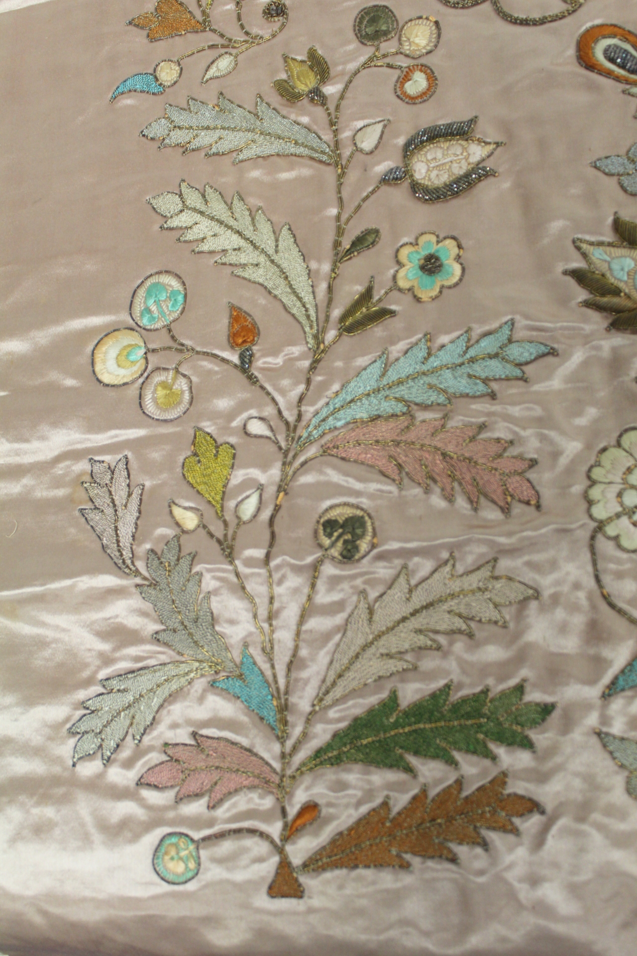 19th or early 20th century Persian embroidered silk panel, the pale pink ground with central panel - Image 6 of 9