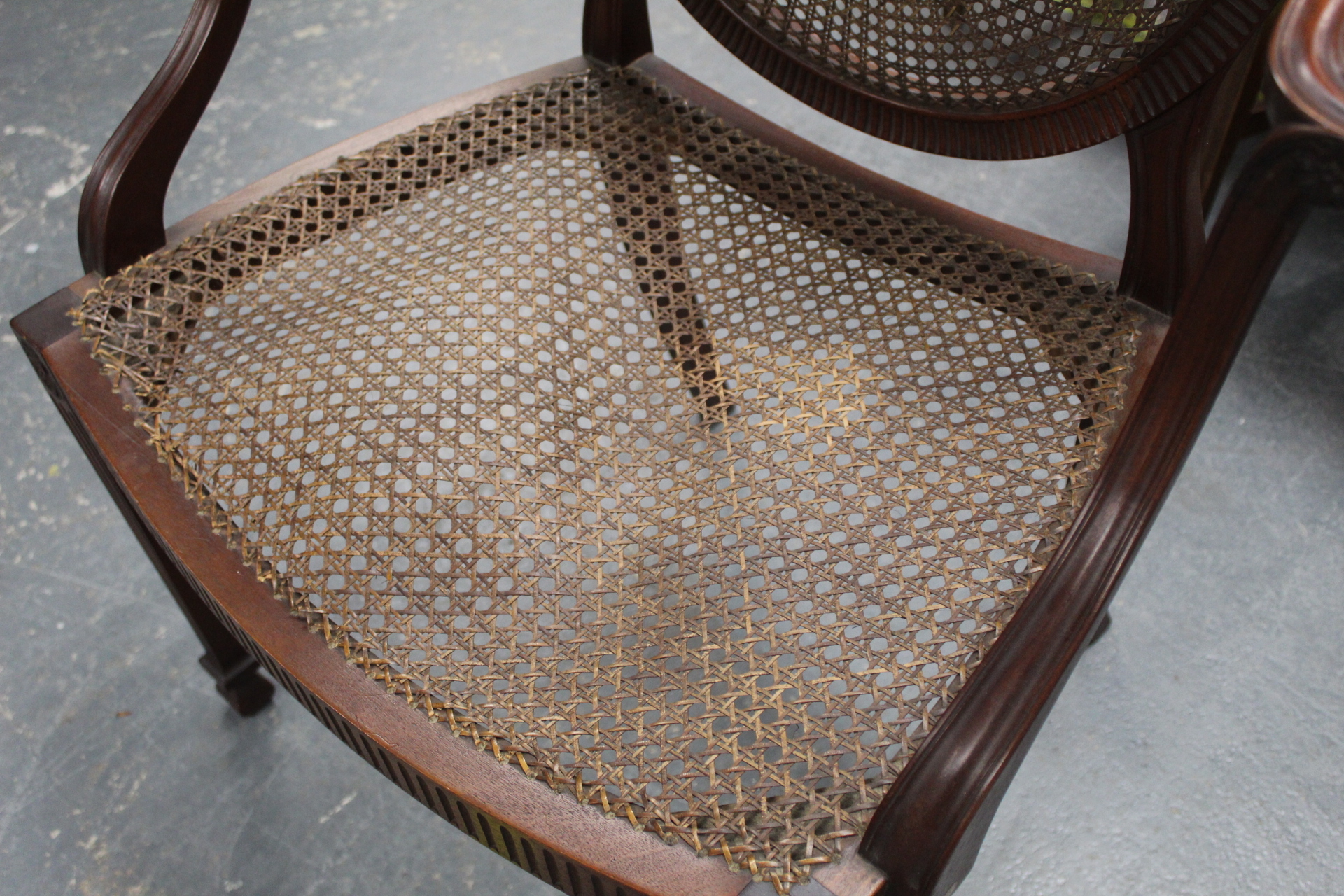 A pair of Sheraton revival mahogany open elbow chairs, the bergere caned circular backs with central - Image 13 of 20