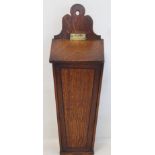Georgian oak hanging candle box of tapered rectangular form with shaped back, sloping hinged lid,