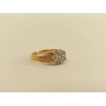 Diamond cluster ring in gold, probably 18ct. Size 'O.