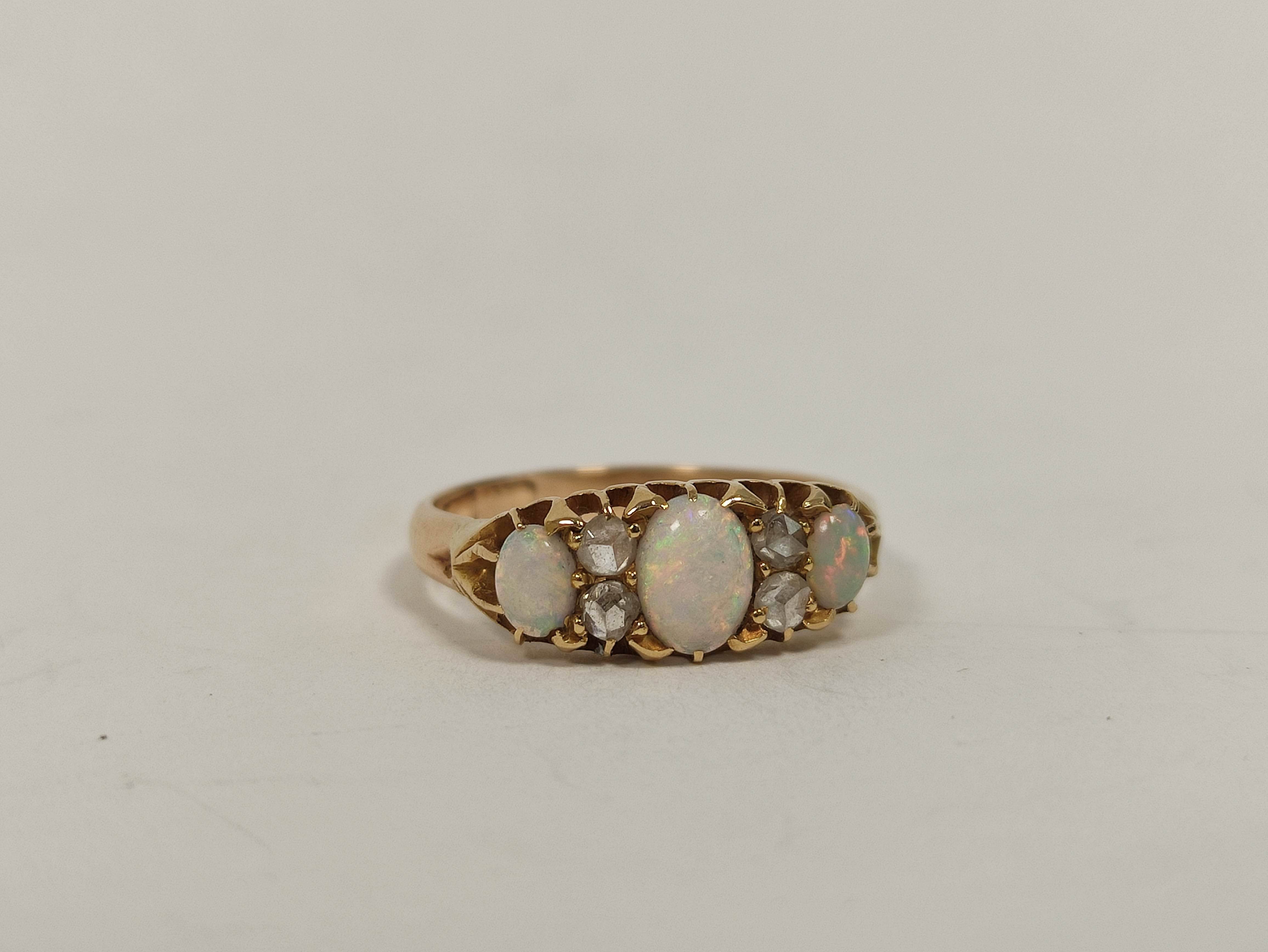 Gold ring with three opals and diamond points, probably 9ct. Size 'M'. - Image 2 of 4