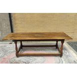 Antique oak and elm refractory dining table with cleated plank top on turned and block supports