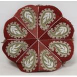 Victorian beadwork and gros point needlework cushion of lobed circular form, with eight panels of