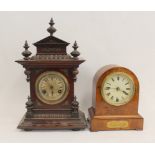 Junghans mantel clock in stained beech case, 43cm and a timepiece in arched case, 1906, 24cm. (2).