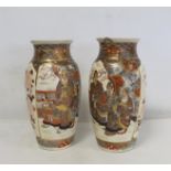 Pair of Japanese satsuma vases of baluster form decorated with panels of figures and flowers, each