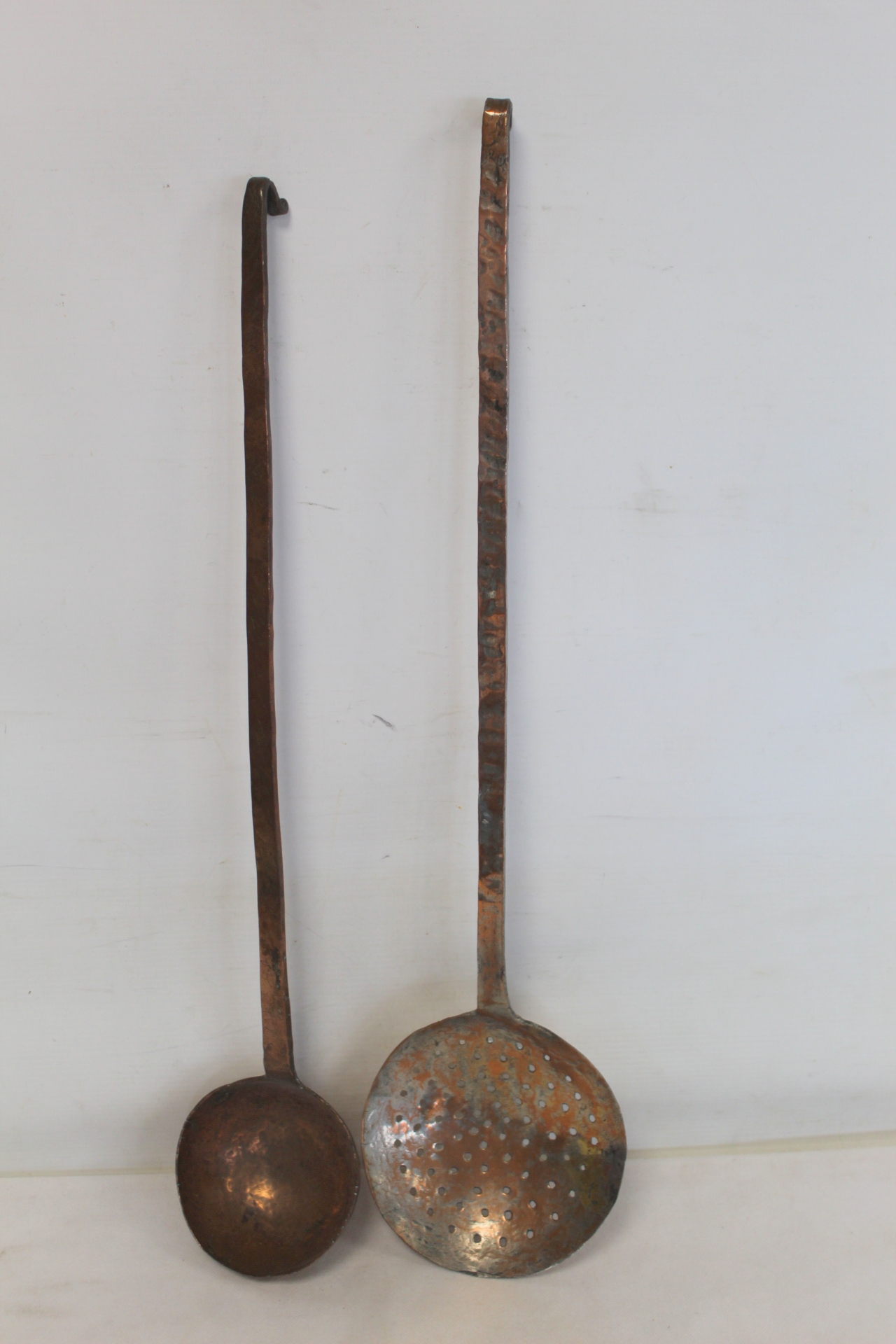 19th century beaten copper ladle, 56cm long and a similar skimmer, 60cm long.  (2). - Image 2 of 5