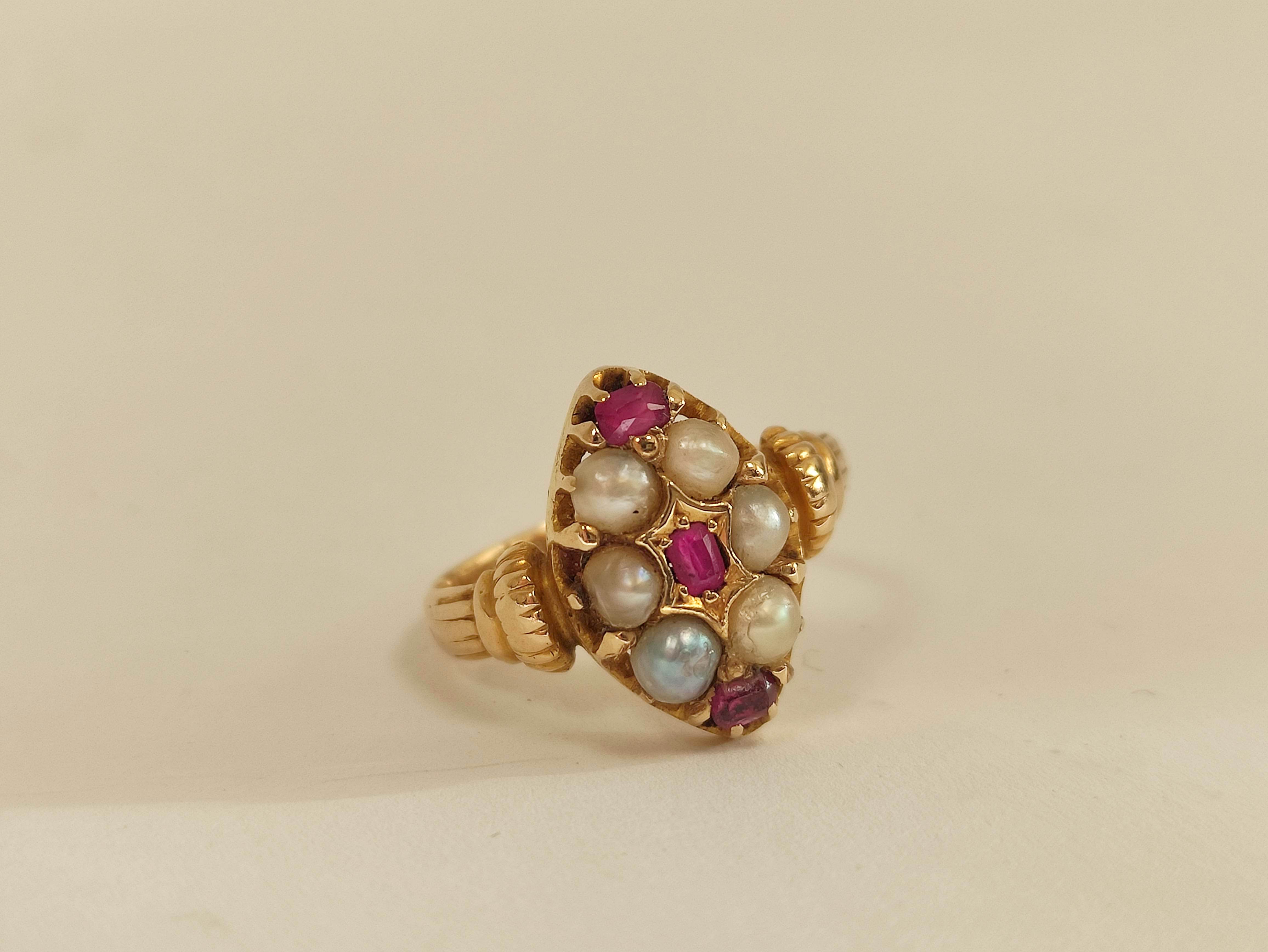 Victorian finger ring with rubies and pearls in 15ct gold, Registration Mark c1870. Size 'J½'.