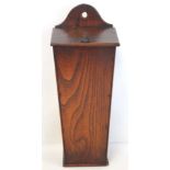 Georgian elm hanging candle box of tapered rectangular form with arched pierced box, sloping